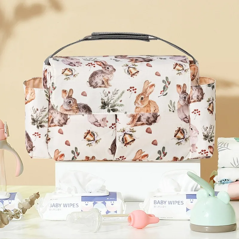 Cross-border Multifunctional Baby Stroller Storage Bag for Bottles and Cups Portable Stroller Accessory Bag
Cross-border Multifunctional Baby Stroller Storage Bag for Bottles and Cups Portable Stroller Accessory Bag