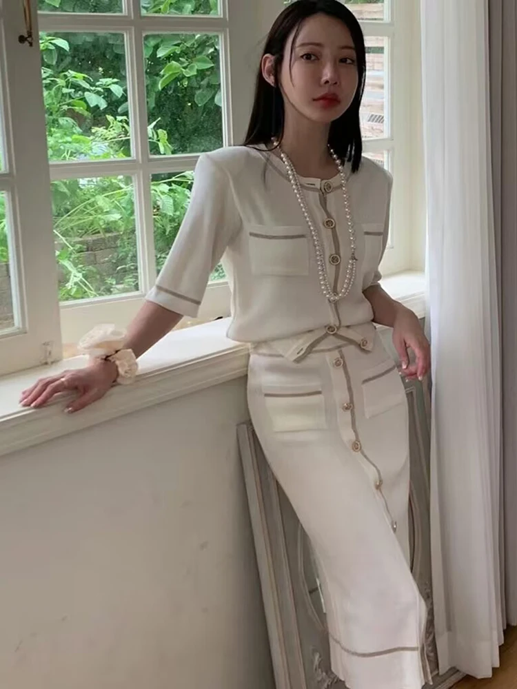 Summer Women's Sweater 2 Piece Set Chic O-Neck Knitted Single-Breasted Cardigan Tops + Mid Casual Elastic Waist Skirt Suits
Summer Women's Sweater 2 Piece Set Chic O-Neck Knitted Single-Breasted Cardigan Tops + Mid Casual Elastic Waist Skirt Suits