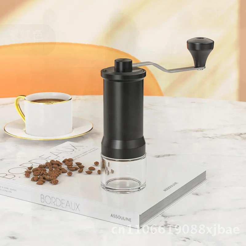 Портативная ручная кофемолка в зернах, маленькая бытовая пивоварка, современный минималистичный стиль для любителей кофе
Портативная ручная кофемолка в зернах, маленькая бытовая пивоварка, современный минималистичный стиль для любителей кофе