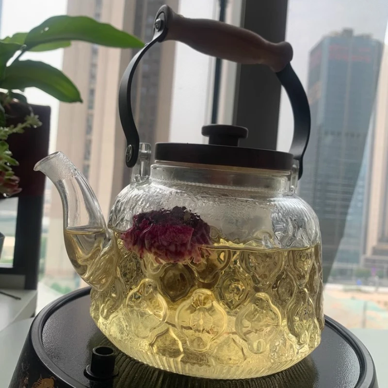 1000ml Walnut Handle Glass Teapot Household High Borosilicate Tea Infuser Steaming Integrated Flower Teapot Can Heat The Kettle
1000ml Walnut Handle Glass Teapot Household High Borosilicate Tea Infuser Steaming Integrated Flower Teapot Can Heat The Kettle