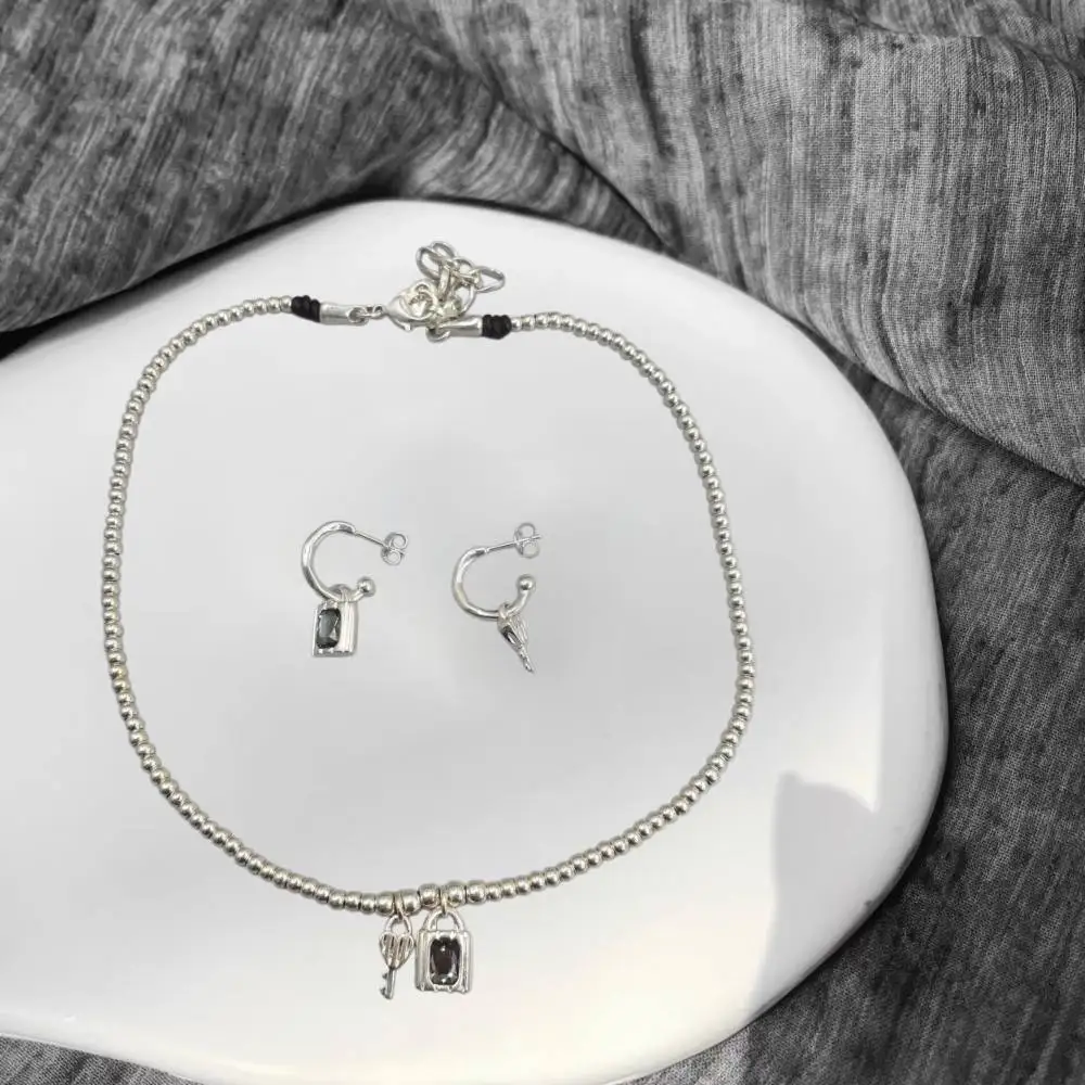 2026 Spain Beautiful Trendy Irregular Grey Crystal Lock Key Earrings Necklace Jewelry Two Piece Set Holiday Gift
2026 Spain Beautiful Trendy Irregular Grey Crystal Lock Key Earrings Necklace Jewelry Two Piece Set Holiday Gift