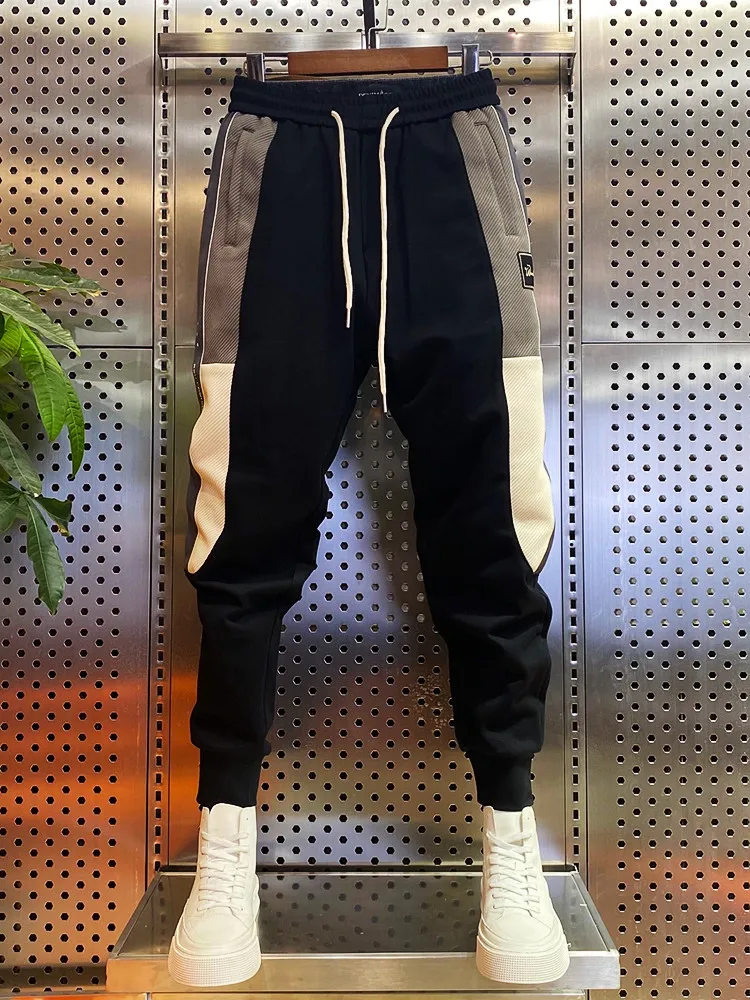 Мужские модные спортивные брюки с цветными вставками, зауженные, укороченные (9/10 длины), свободного кроя, повседневные, весна-осень, новинка, с манжетами
Мужские модные спортивные брюки с цветными вставками, зауженные, укороченные (9/10 длины), свободного кроя, повседневные, весна-осень, новинка, с манжетами