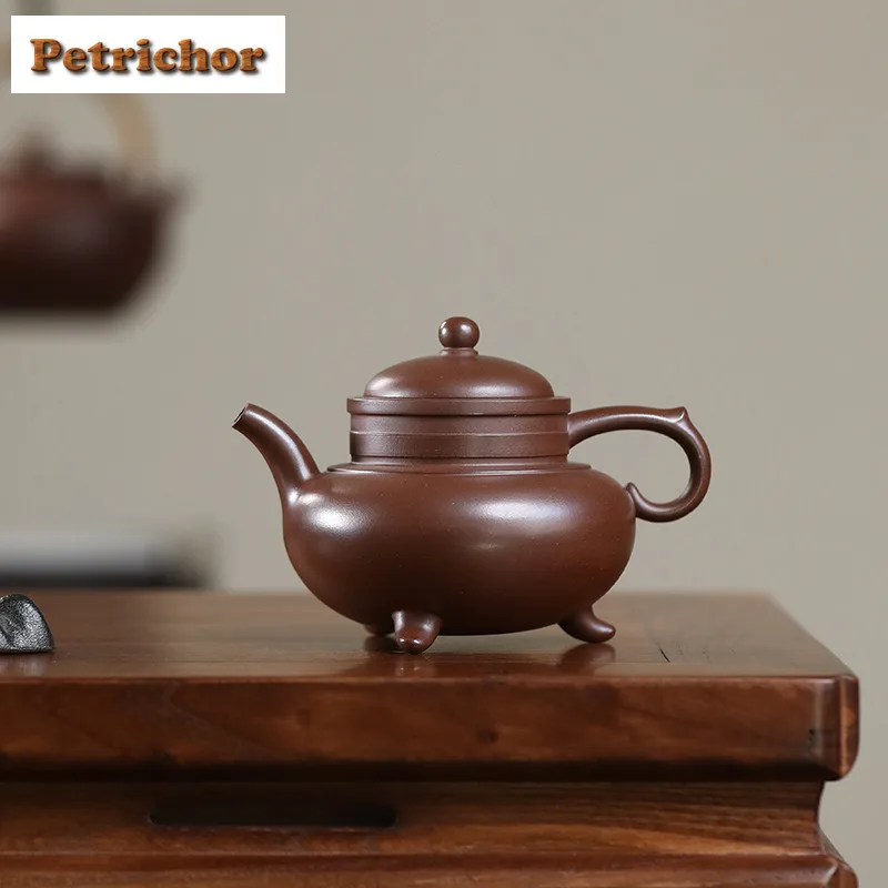 270ml Antique Yixing Purple Clay Teapots Handmade Tripodia Pot Raw Ore Purple Mud Kettle With Infuser Chinese Zisha Tea Set Gift
270ml Antique Yixing Purple Clay Teapots Handmade Tripodia Pot Raw Ore Purple Mud Kettle With Infuser Chinese Zisha Tea Set Gift