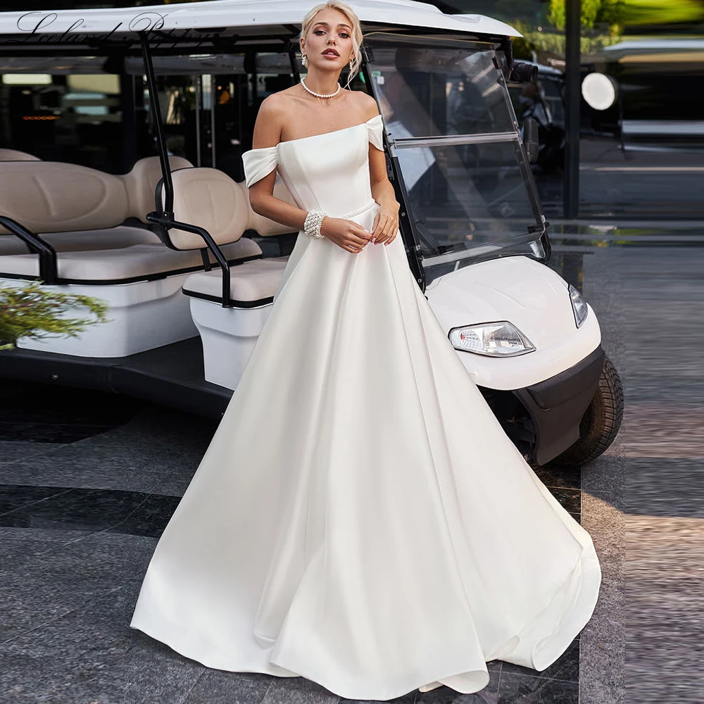 Lceland Poppy Elegant A Line Boat Neck Satin Wedding Dresses Floor Length Beaded Belt Bridal Gowns with Court Train
Lceland Poppy Elegant A Line Boat Neck Satin Wedding Dresses Floor Length Beaded Belt Bridal Gowns with Court Train
