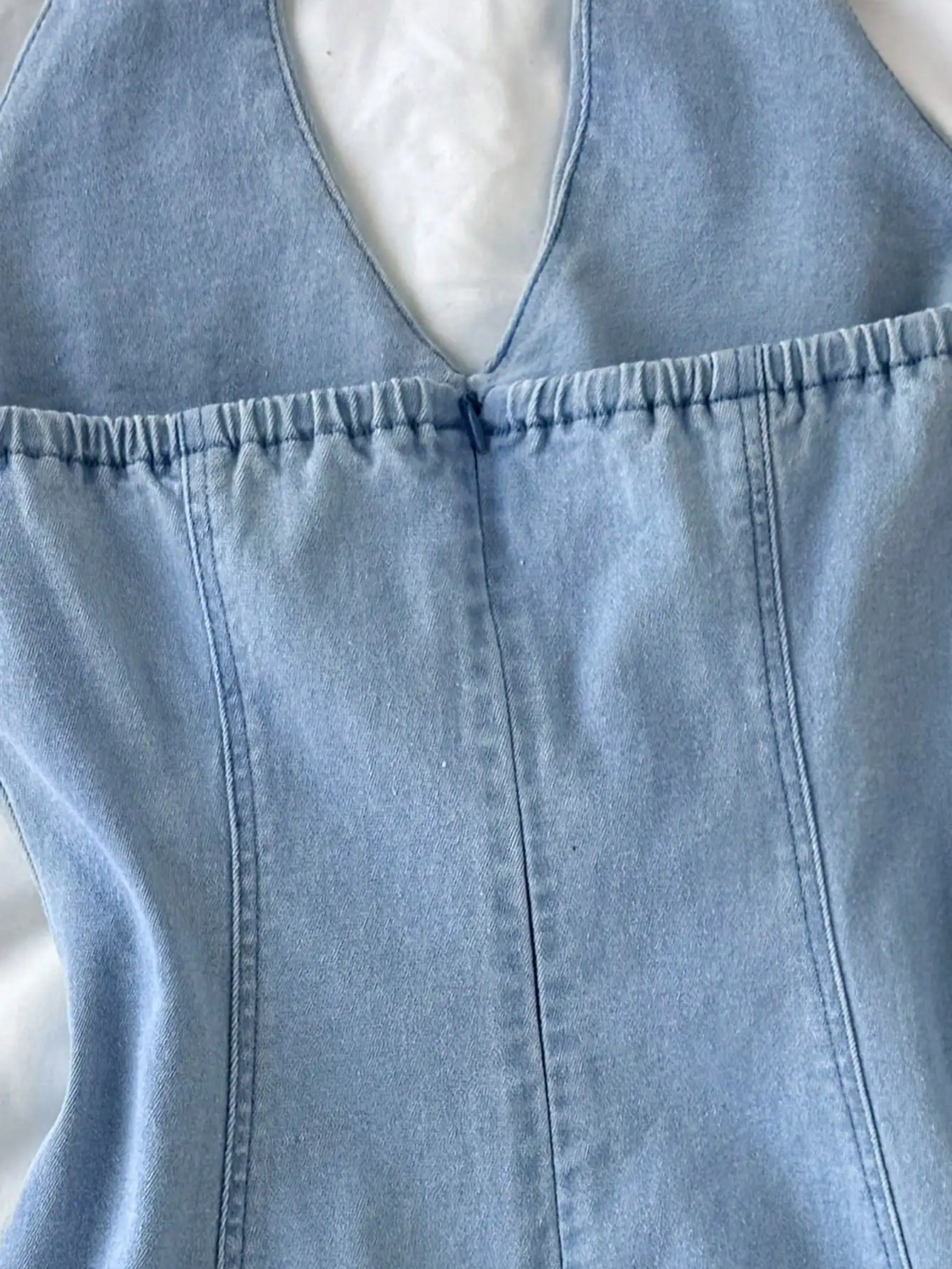 Sleeveless Light Wash Denim Mini Dress With Halter Neck, A-Line Silhouette, Front Bow Accent For Summer Spring Casual Or
Sleeveless Light Wash Denim Mini Dress With Halter Neck, A-Line Silhouette, Front Bow Accent For Summer Spring Casual Or