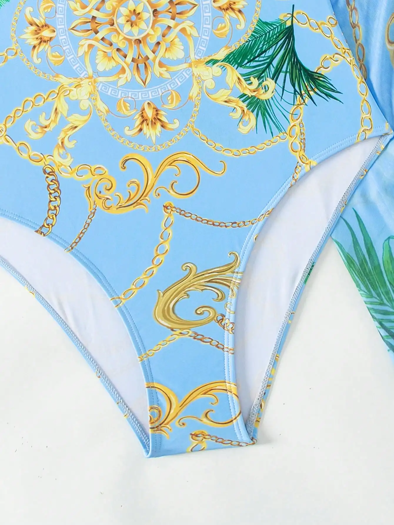 Blue Chain Print Push Up One Piece Swimsuit With Beach Skirt
Blue Chain Print Push Up One Piece Swimsuit With Beach Skirt