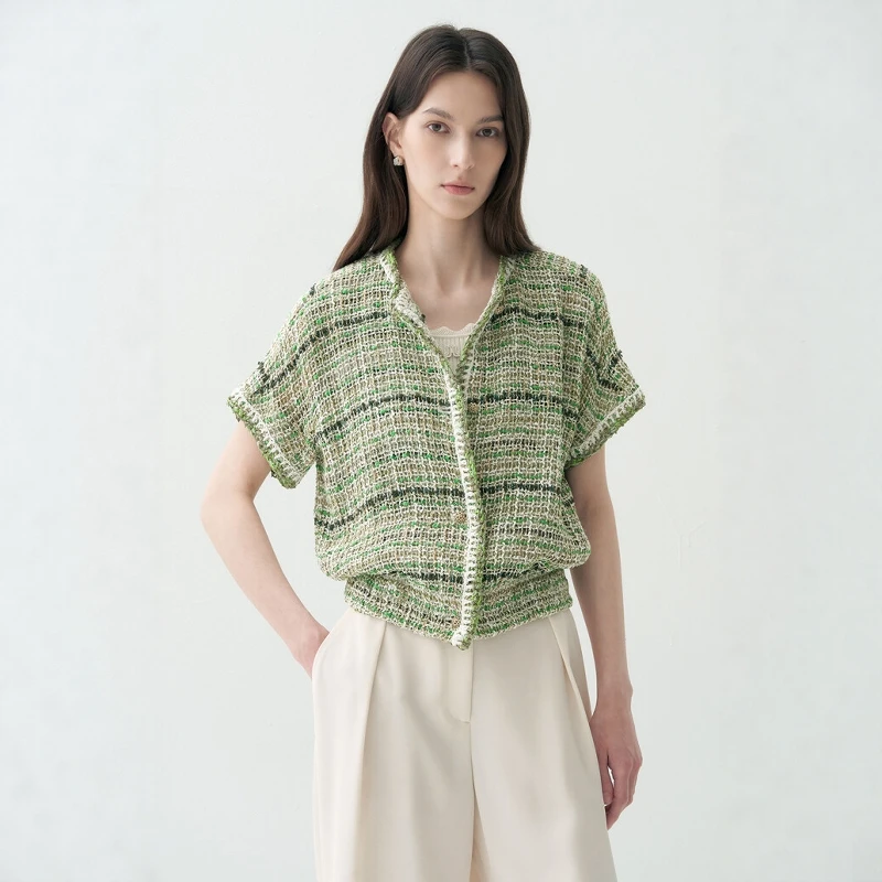 Elegant Hollow out Knitted Short Sleeve Cardigan with Tweed Skirt for Women Summer 2026 Loose Fit round Neck Button Detail
Elegant Hollow out Knitted Short Sleeve Cardigan with Tweed Skirt for Women Summer 2026 Loose Fit round Neck Button Detail