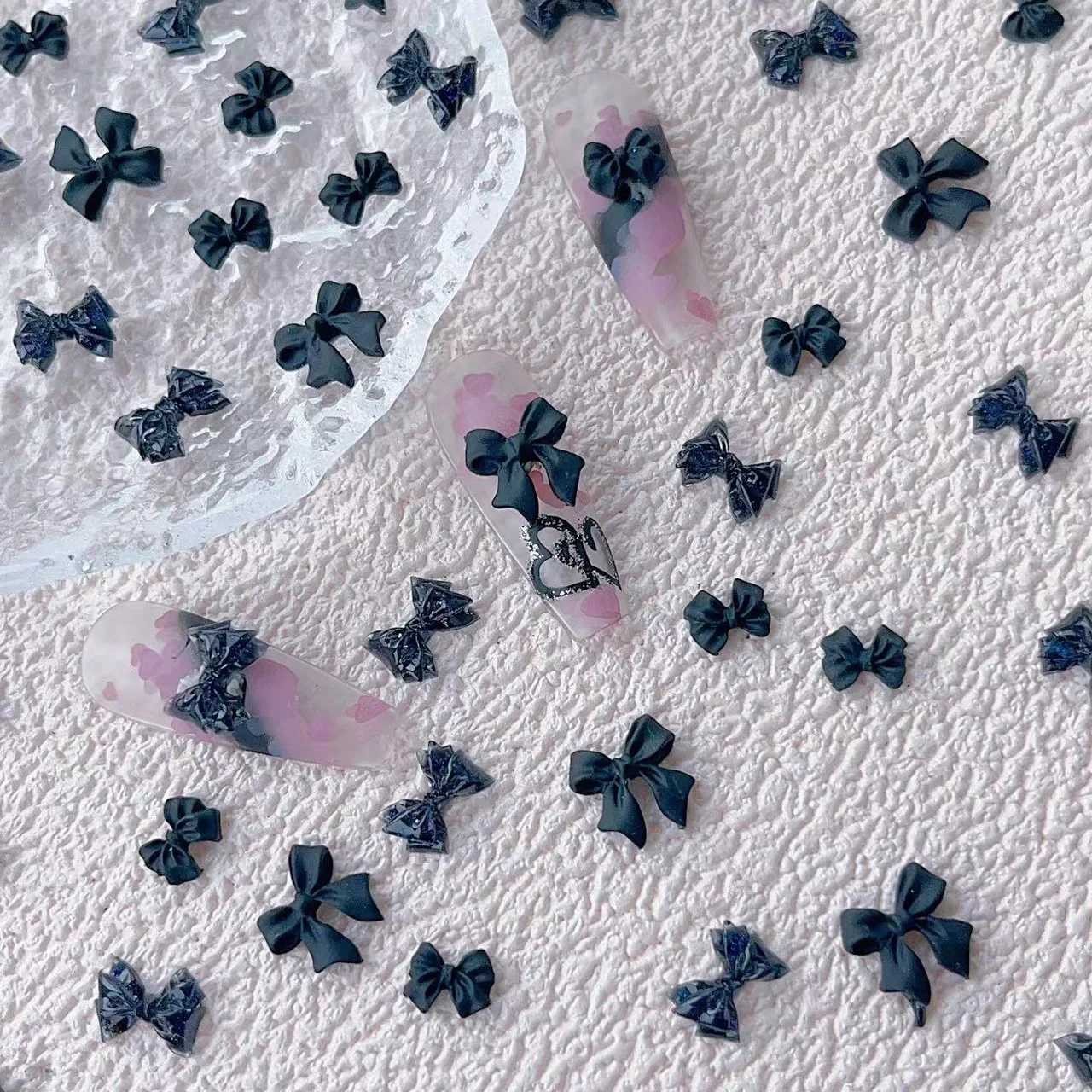 50pcs Classic Black Bow Nail Art Charms Parts 3D Flatback Resin Nail Rhinestones Sweet Cool Bow Nail Decoration Accessories DIY
50pcs Classic Black Bow Nail Art Charms Parts 3D Flatback Resin Nail Rhinestones Sweet Cool Bow Nail Decoration Accessories DIY