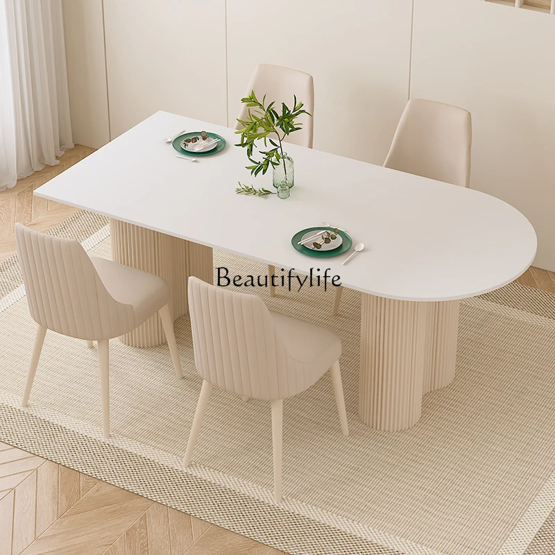 French cream wind pure white rock slab dining table small apartment island integrated against the wall
French cream wind pure white rock slab dining table small apartment island integrated against the wall