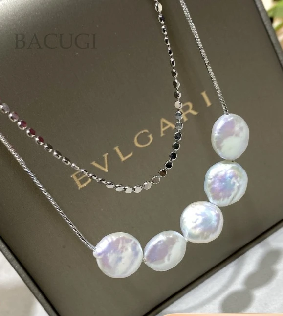 Двухслойное ожерелье из натурального пресноводного жемчуга в стиле барокко
Двухслойное ожерелье из натурального пресноводного жемчуга в стиле барокко