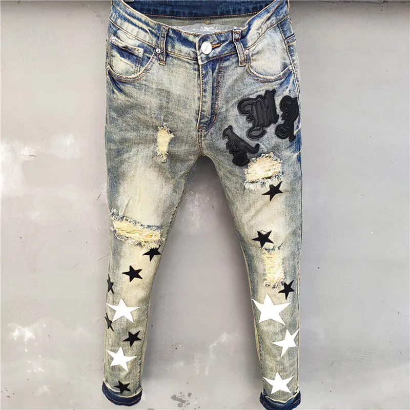 High Quality Men Jean Hole Patch Fashion Versatile Ripped Jeans Stretch Pencil Pant Streetwear Elastic Hip Hop Star Pattern Jean
High Quality Men Jean Hole Patch Fashion Versatile Ripped Jeans Stretch Pencil Pant Streetwear Elastic Hip Hop Star Pattern Jean