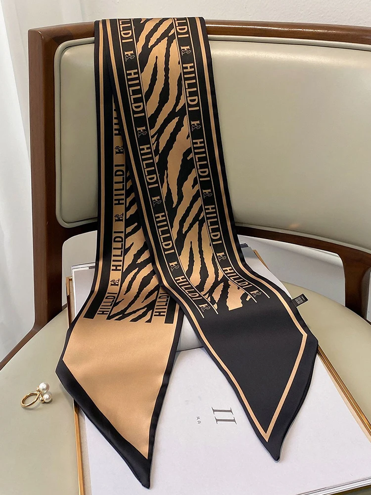 2026 Fashion Silk Scarf Women Neck Long Scarves Narrow Office Lady Shawl Bandanas Luxury High Quality Scarf Leopard Brown
2026 Fashion Silk Scarf Women Neck Long Scarves Narrow Office Lady Shawl Bandanas Luxury High Quality Scarf Leopard Brown