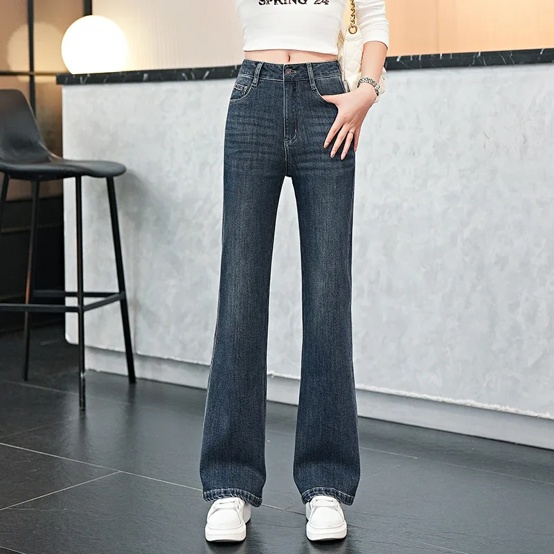 Винтажные утягивающие расклешенные брюки с высокой талией для женщин, осенние новые модные универсальные эластичные джинсы Bootcut
Винтажные утягивающие расклешенные брюки с высокой талией для женщин, осенние новые модные универсальные эластичные джинсы Bootcut