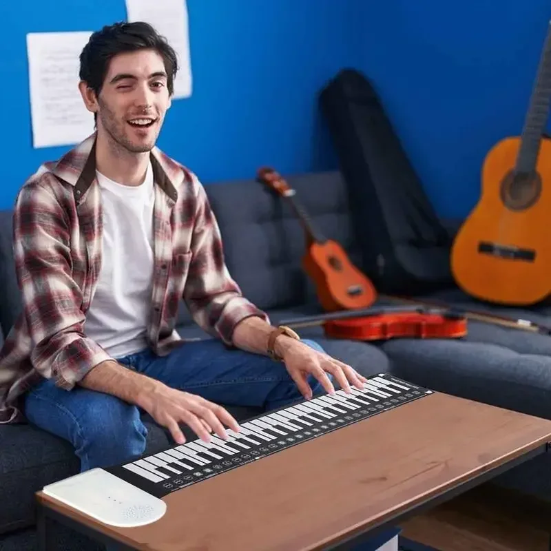 tt Piano portable à rouler à 49 touches, clavier musical pliable à main, sensible au voyage, 49 prédire
tt Piano portable à rouler à 49 touches, clavier musical pliable à main, sensible au voyage, 49 prédire