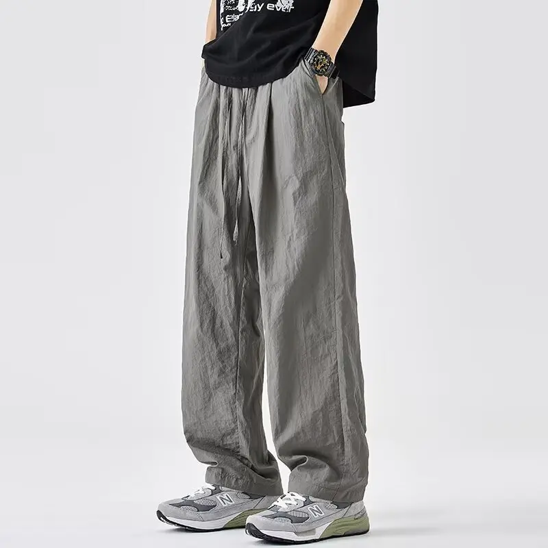 Men's Casual Sports Drawstring Cargo Pants Elastic Waist Loose Straight Comfortable Pants
Men's Casual Sports Drawstring Cargo Pants Elastic Waist Loose Straight Comfortable Pants