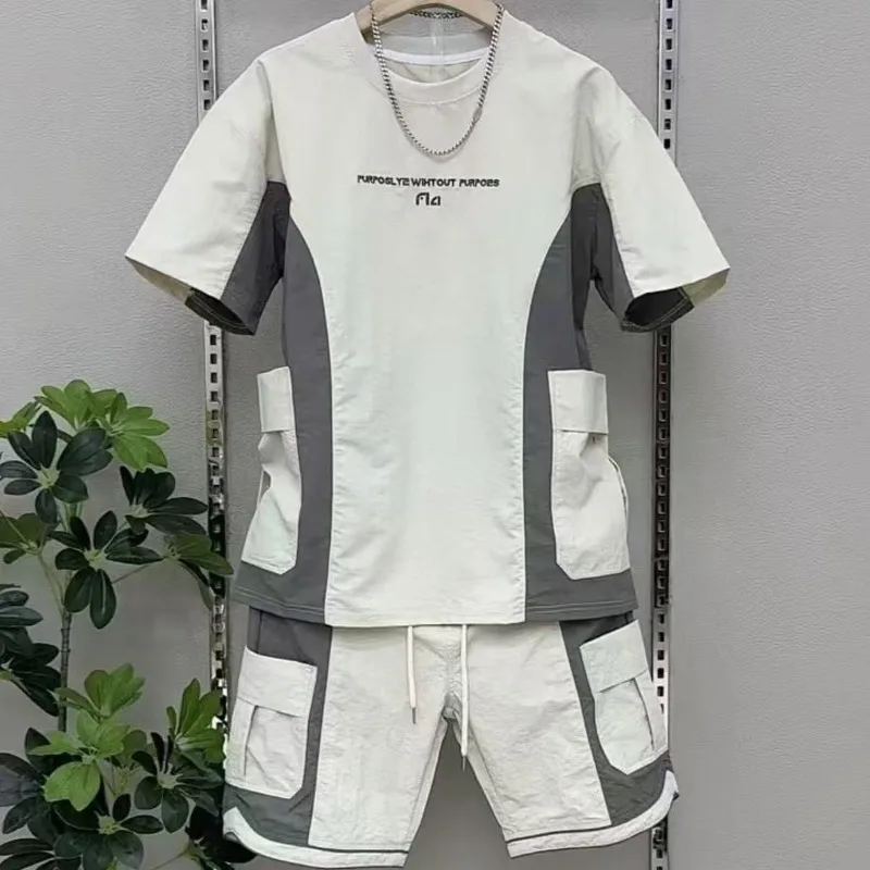 Summer Men's Quick Drying T-shirt Set Color Matching Round Neck Short Sleeve Tops Multi Pockets Outdoor Cargo Shorts Tracksuit
Summer Men's Quick Drying T-shirt Set Color Matching Round Neck Short Sleeve Tops Multi Pockets Outdoor Cargo Shorts Tracksuit