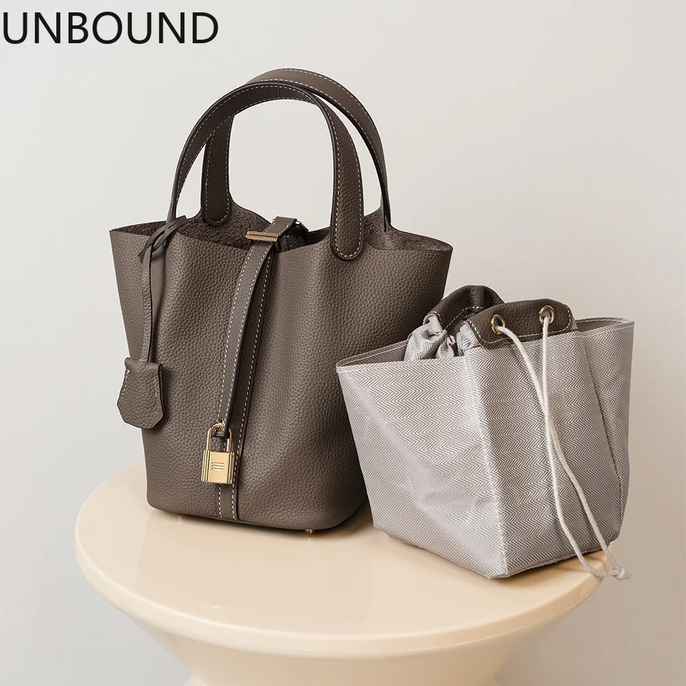 UNBOUND genuine leather bucket bag womens togo top grain cowhide luxury wedding handbag basket tote minimal commuter elegant new
UNBOUND genuine leather bucket bag womens togo top grain cowhide luxury wedding handbag basket tote minimal commuter elegant new
