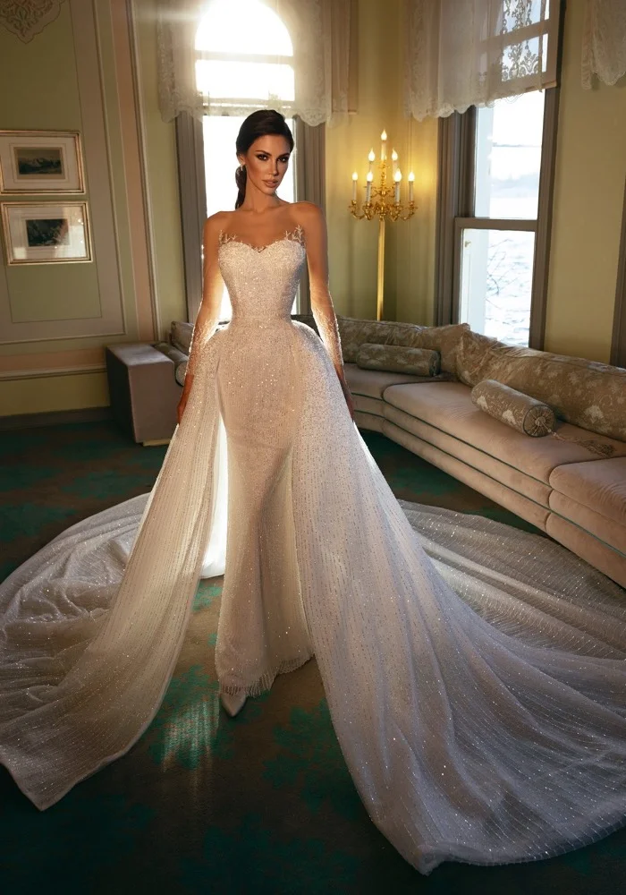 Роскошное свадебное платье русалки с 3D кружевной вышивкой бисером и съемной юбкой по индивидуальному заказу, сексуальное свадебное платье с открытой спиной в форме сердца
Роскошное свадебное платье русалки с 3D кружевной вышивкой бисером и съемной юбкой по индивидуальному заказу, сексуальное свадебное платье с открытой спиной в форме сердца