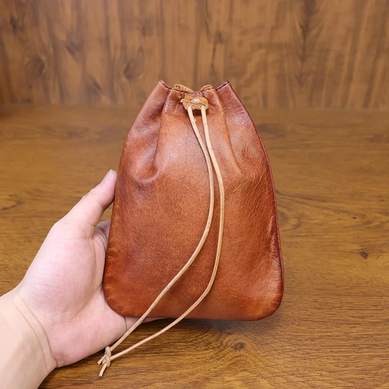 Handcrafted Vintage Style Top Layer Cowhide Leather Coin Purse Drawstring Loose Change Wallet Snack Bag Plaything Bag
Handcrafted Vintage Style Top Layer Cowhide Leather Coin Purse Drawstring Loose Change Wallet Snack Bag Plaything Bag