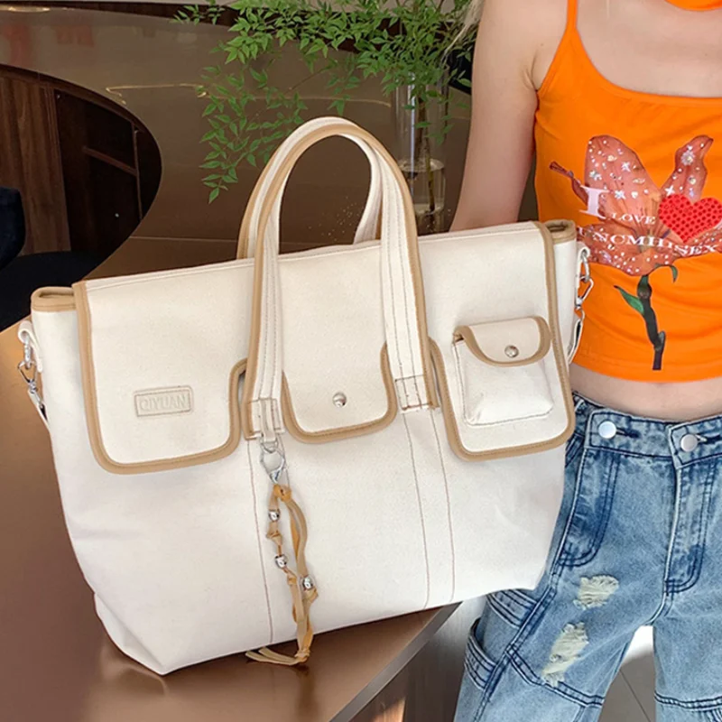 Luxury Multi-pocket Designer Bag For Women Canvas Shoulder Bag Versatile Large Capacity Crossbody Bag Korean Durable Handbag
Luxury Multi-pocket Designer Bag For Women Canvas Shoulder Bag Versatile Large Capacity Crossbody Bag Korean Durable Handbag