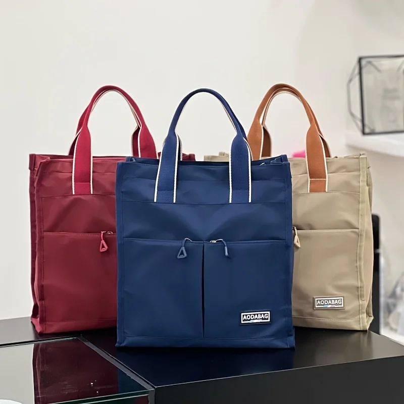 Large Capacity Nylon Tote Bag, Multi-Pocket Zipper Closure School Work Bag, Machine Washable for Students Books Lunch
Large Capacity Nylon Tote Bag, Multi-Pocket Zipper Closure School Work Bag, Machine Washable for Students Books Lunch