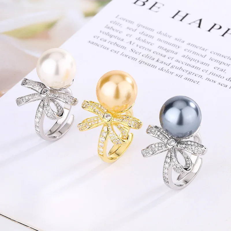 New Jewelry Model: Copper Base, Gold Plated, Inlaid with Pearls, Vintage Bow Ring for Women, 14mm
New Jewelry Model: Copper Base, Gold Plated, Inlaid with Pearls, Vintage Bow Ring for Women, 14mm