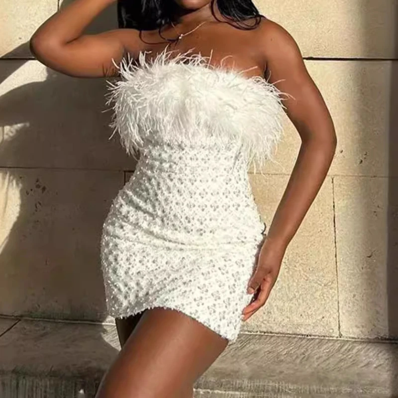 Белая облегающая мини-юбка с перьями и бисером, расшитая блестками, европейская и американская модная юбка для банкетной вечеринки, новая горячая распродажа, высокого класса 
Белая облегающая мини-юбка с перьями и бисером, расшитая блестками, европейская и американская модная юбка для банкетной вечеринки, новая горячая распродажа, высокого класса