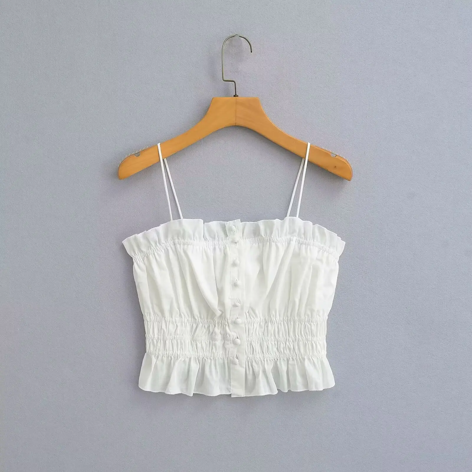Women's 2024 New Fashion Joker Wooden Ear Fold Design Button Camis Vest Retro Sleeveless Thin Shoulder Strap Chic Top.
Women's 2024 New Fashion Joker Wooden Ear Fold Design Button Camis Vest Retro Sleeveless Thin Shoulder Strap Chic Top.