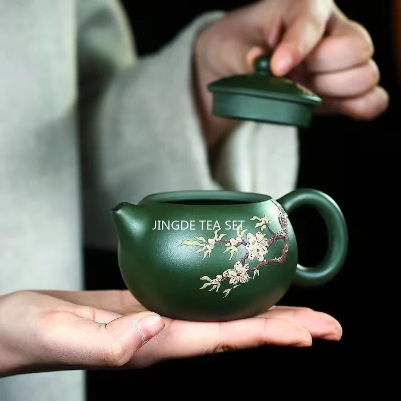 200ml Yixing purple clay peach blossom teapot mineral green clay, Xishi filter teapot business Tea set
200ml Yixing purple clay peach blossom teapot mineral green clay, Xishi filter teapot business Tea set