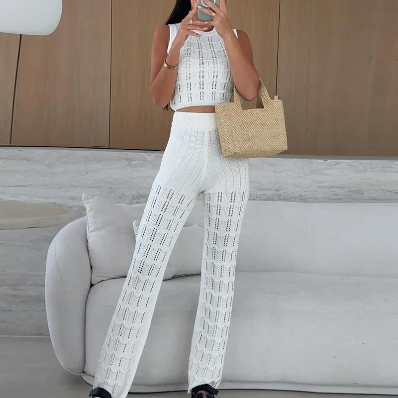Fashion Solid Color Knit Hollow Out 2pc Chic Women Sleeveless Wave Texture Pullover And Long Pants Sets Summer New Commute Sets
Fashion Solid Color Knit Hollow Out 2pc Chic Women Sleeveless Wave Texture Pullover And Long Pants Sets Summer New Commute Sets