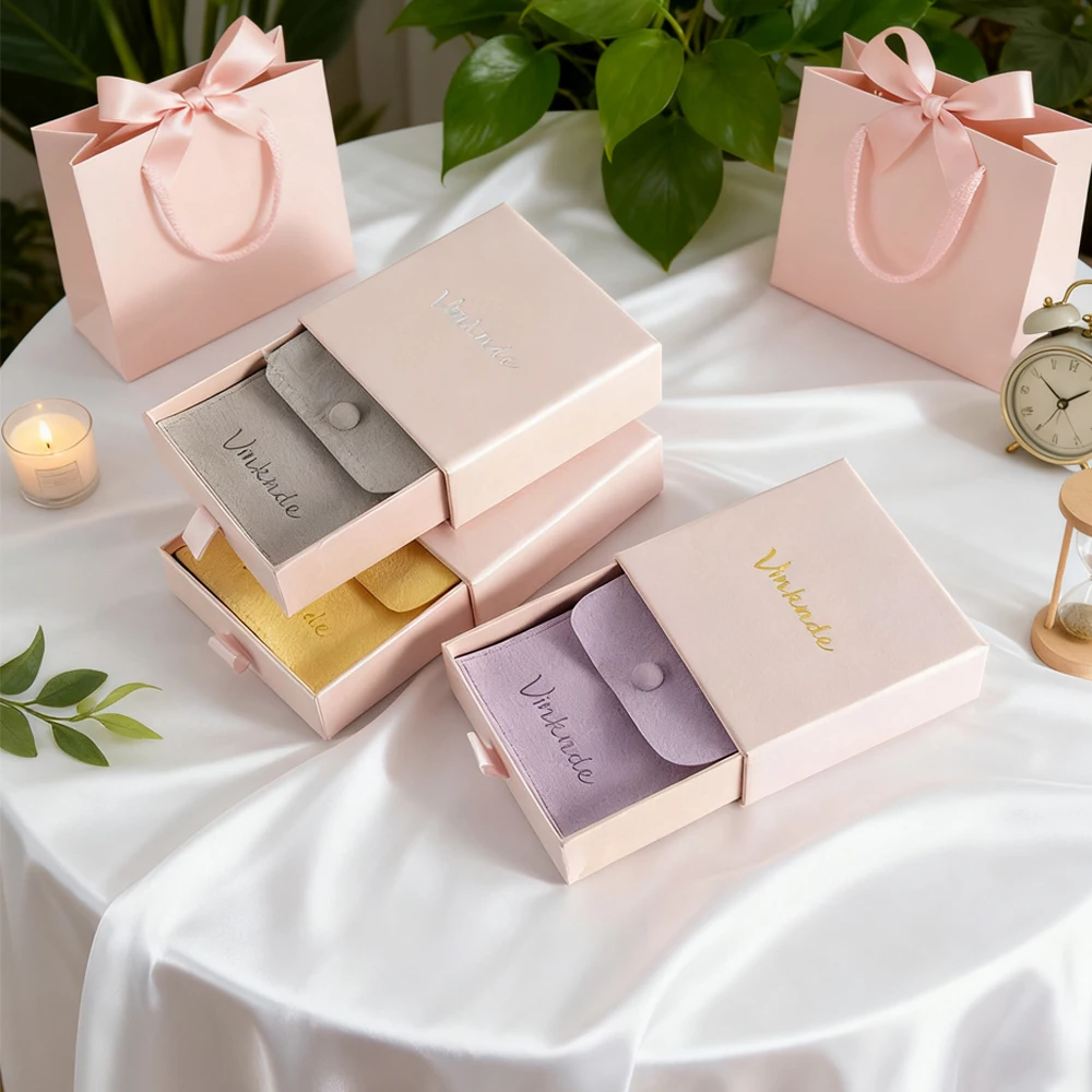 50pcs Jewelry Storage Drawer Box Mini Portable Travel Stud Earrings Necklace with Velvet Snap Bag Custom Creative Organizer Case
50pcs Jewelry Storage Drawer Box Mini Portable Travel Stud Earrings Necklace with Velvet Snap Bag Custom Creative Organizer Case