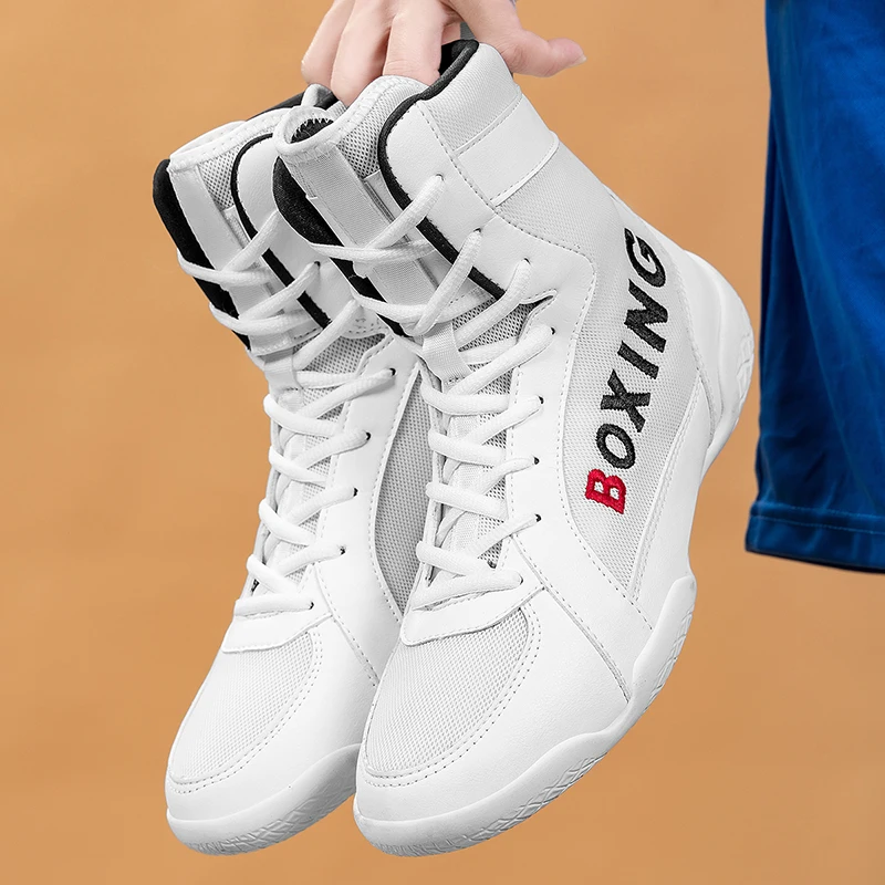 Universal boxing boots Wrestling shoes for man Boxing shoes Women's Fitness Light Luxury Fighting Boots Classic Man sneakers
Universal boxing boots Wrestling shoes for man Boxing shoes Women's Fitness Light Luxury Fighting Boots Classic Man sneakers