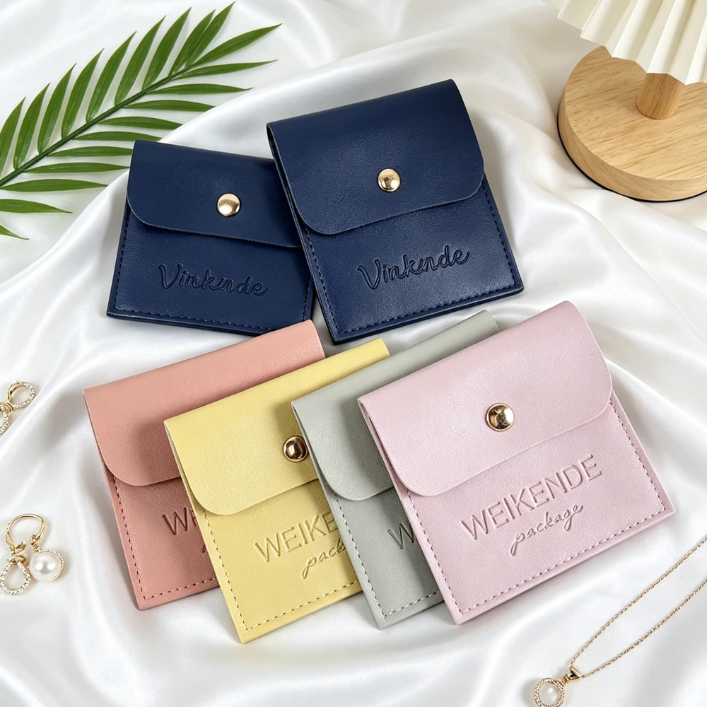 100Pcs Custom Logo Leather Jewelry Packaging Bags 9x9cm PU Snap Button Bag Wedding Favors Gift Pouches For Rings Earrings Beads
100Pcs Custom Logo Leather Jewelry Packaging Bags 9x9cm PU Snap Button Bag Wedding Favors Gift Pouches For Rings Earrings Beads