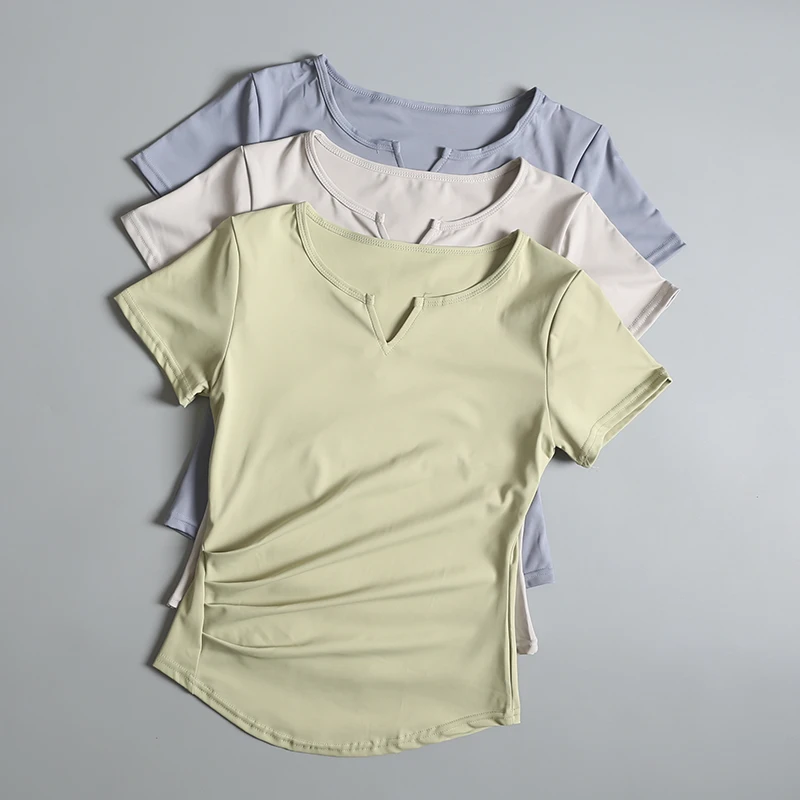 Yoga suit short-sleeved women's V-neck temperament summer thin running sports top pleated slim Pilates fitness T-shirt
Yoga suit short-sleeved women's V-neck temperament summer thin running sports top pleated slim Pilates fitness T-shirt