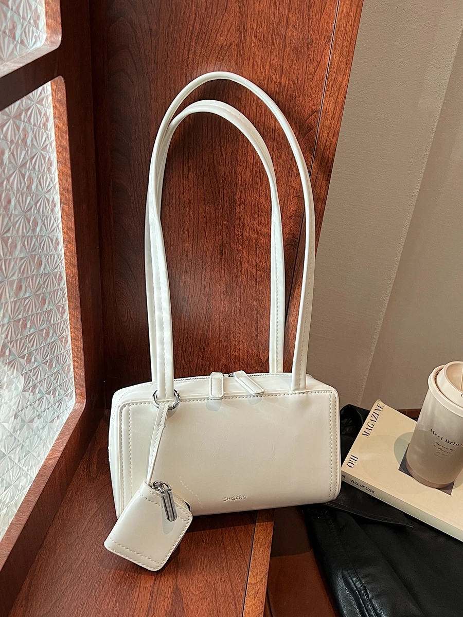French Simple PU Shoulder Bags for Women Spring Summer Trend Solid Color Small Square Pack Ladies Commuting Handbags
French Simple PU Shoulder Bags for Women Spring Summer Trend Solid Color Small Square Pack Ladies Commuting Handbags
