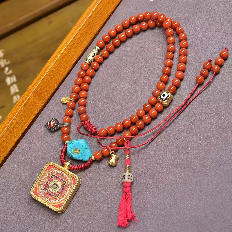 Tibetan-style cultural artifact small mandala thangka Buddha pendant sweater chain, hand-woven and adjustable red agate necklace
Tibetan-style cultural artifact small mandala thangka Buddha pendant sweater chain, hand-woven and adjustable red agate necklace