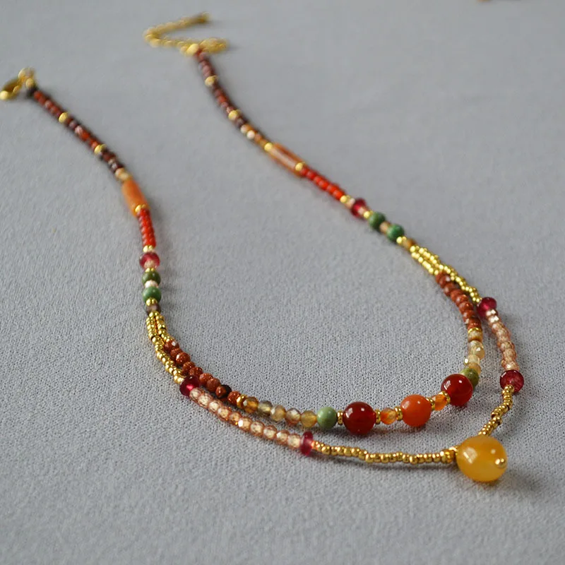 New Niche Design Autumn and Winter National Trend New Chinese Style Retro Literary Real Stone Beaded Double Layered Necklace
New Niche Design Autumn and Winter National Trend New Chinese Style Retro Literary Real Stone Beaded Double Layered Necklace