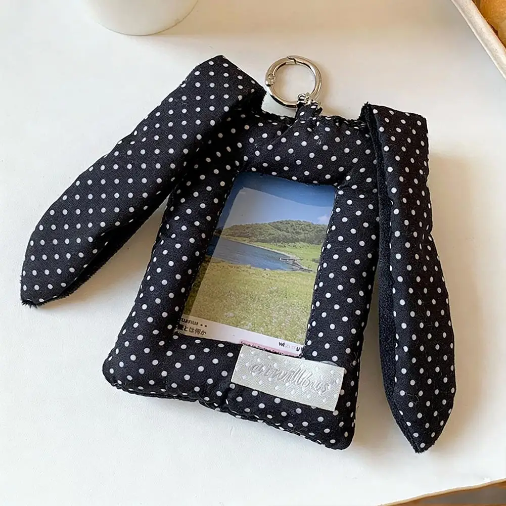 1 шт. Милый держатель для фотокарточек в корейском стиле с ушками кролика в горошек, мягкий, в виде подушки, подарок, подвеска для сумки
1 шт. Милый держатель для фотокарточек в корейском стиле с ушками кролика в горошек, мягкий, в виде подушки, подарок, подвеска для сумки