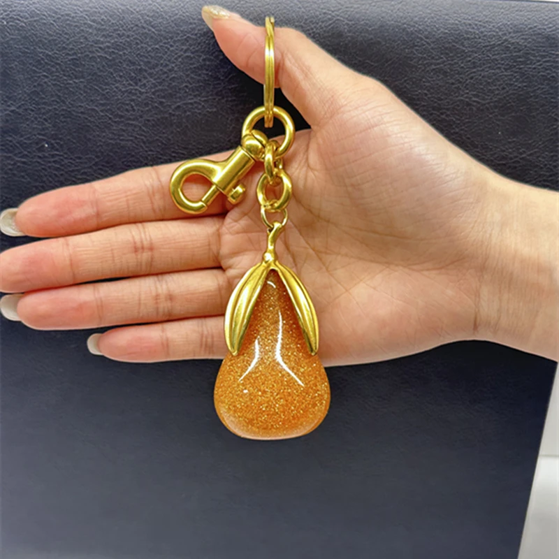 2025 New Exquisite Crystal Orange Pear Pendant For Coach For Goyard Handbag Shoulder Bag Diy Bag Charms Accessory Gift
2025 New Exquisite Crystal Orange Pear Pendant For Coach For Goyard Handbag Shoulder Bag Diy Bag Charms Accessory Gift