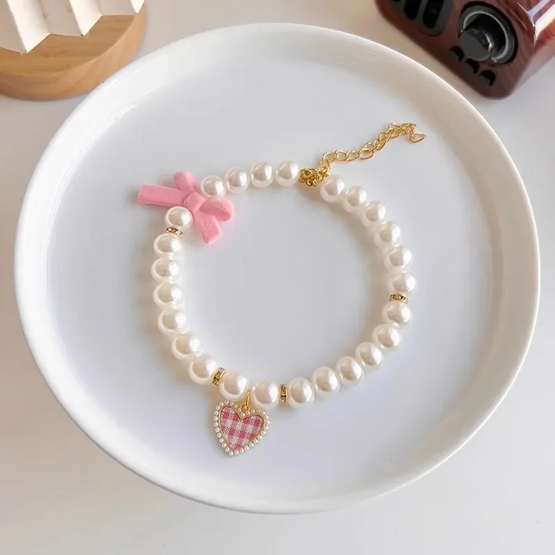 Adjustable Pet Pearl Collar Heart Jewelry Pendant Princess Bow Dog Necklace Sweet Decorations Rhinestone Puppy Cat Collar
Adjustable Pet Pearl Collar Heart Jewelry Pendant Princess Bow Dog Necklace Sweet Decorations Rhinestone Puppy Cat Collar