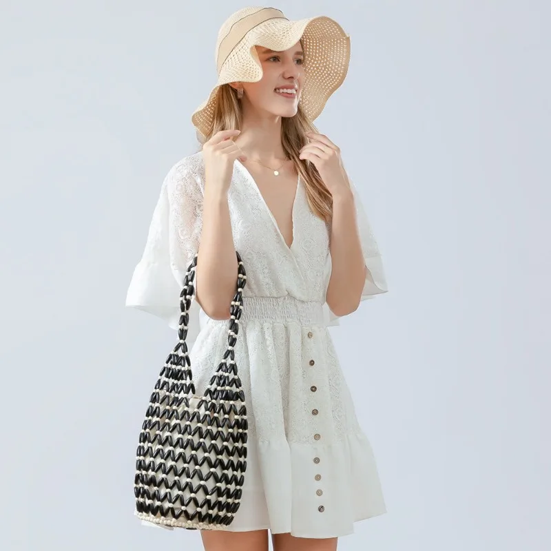 Women's Woven Beach Bag - Hollow-out Wooden Bead Tote Bucket Purse, Netted Canvas Shoulder Bag for Summer Vacation
Women's Woven Beach Bag - Hollow-out Wooden Bead Tote Bucket Purse, Netted Canvas Shoulder Bag for Summer Vacation