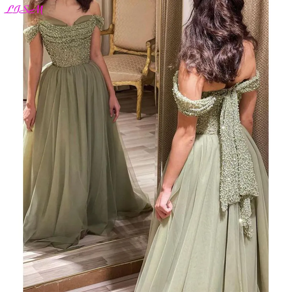Green Tulle Long Evening Dresses 2023 Glitter Sequins Beaded Prom Dress Plus Size Mother Bride Gowns Arabic Women Formal
Green Tulle Long Evening Dresses 2023 Glitter Sequins Beaded Prom Dress Plus Size Mother Bride Gowns Arabic Women Formal