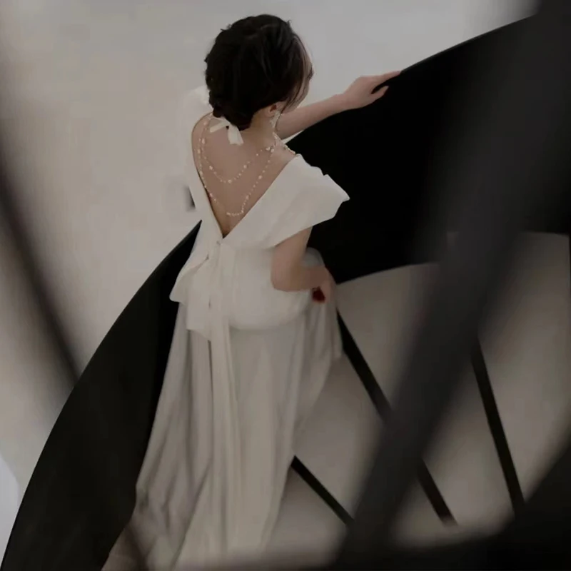 Retro Light Wedding Dress New 2026 Satin Surface Bride Going out Veil Forest System Simple Small Fish Tail Gown Skirt
Retro Light Wedding Dress New 2026 Satin Surface Bride Going out Veil Forest System Simple Small Fish Tail Gown Skirt
