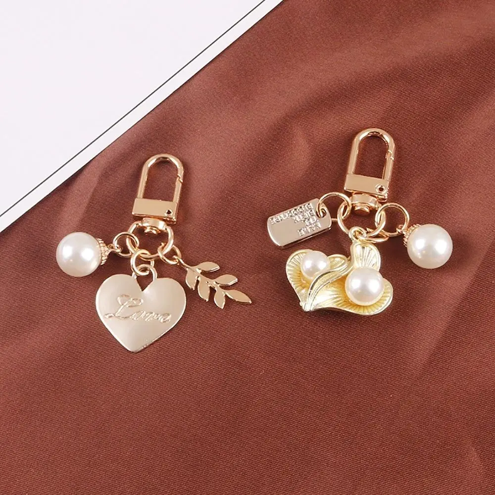 Student Creative Male Shell Bag Pendant Metal Pearl Heart Keychain Korean Style Key Lanyard Letter Women Car Keyring
Student Creative Male Shell Bag Pendant Metal Pearl Heart Keychain Korean Style Key Lanyard Letter Women Car Keyring