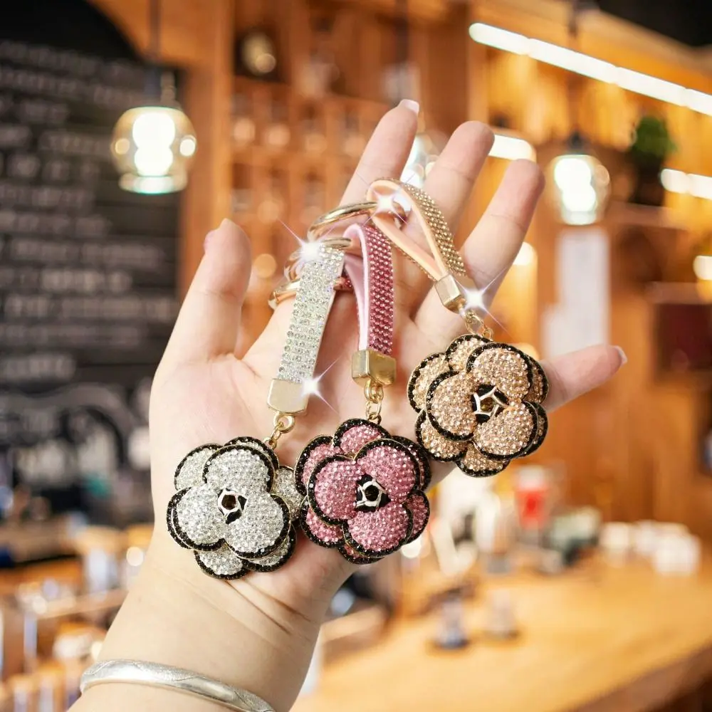 Light Luxury Rhinestone Camellia Flower Keychain Accessories Ornament Car Keyring Holder Cute Creative Car Interior Decor Gift
Light Luxury Rhinestone Camellia Flower Keychain Accessories Ornament Car Keyring Holder Cute Creative Car Interior Decor Gift