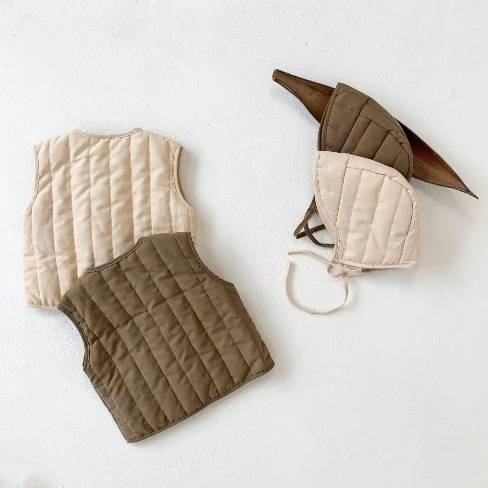 Korean Style Autumn Winter Baby Vest Solid color Thickened Cotton Coat Unisex with Hat Jackets for Girls Boys
Korean Style Autumn Winter Baby Vest Solid color Thickened Cotton Coat Unisex with Hat Jackets for Girls Boys