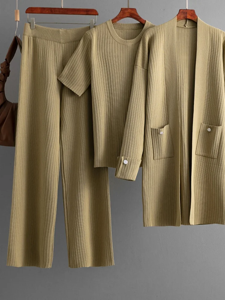 Fashion suit women's autumn and winter short sleeved top mid to long cardigan jacket wide leg pants three piece set
Fashion suit women's autumn and winter short sleeved top mid to long cardigan jacket wide leg pants three piece set