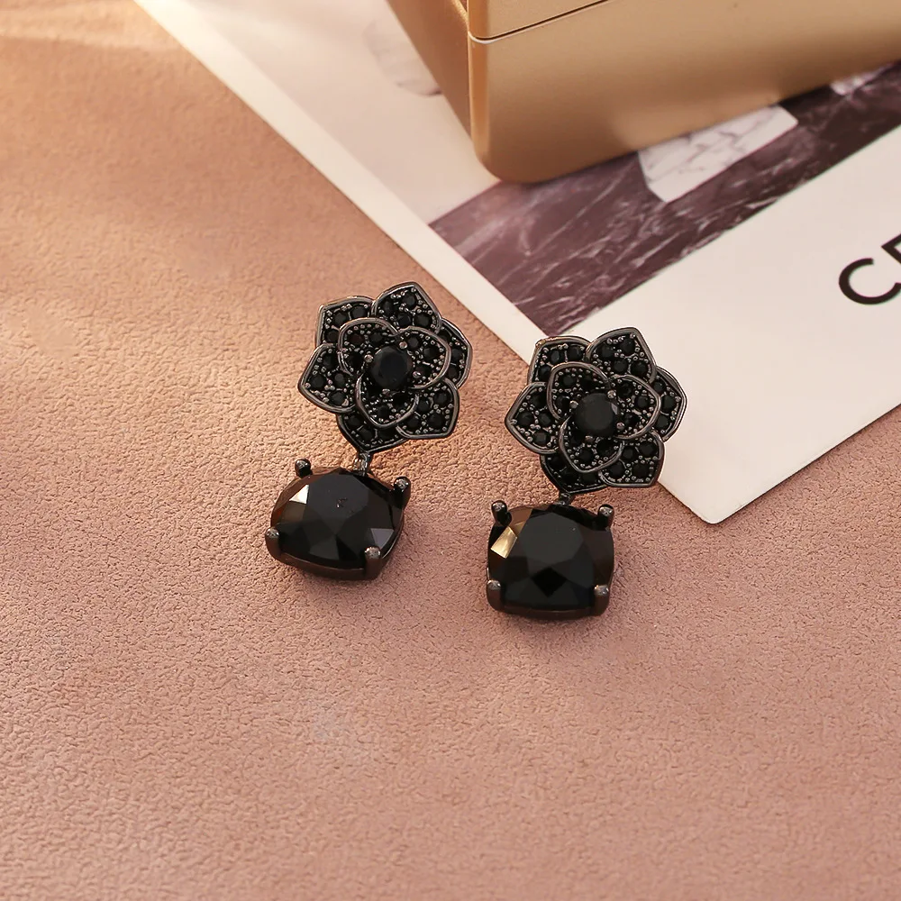 Fashionable and exquisite black camellia zircon earrings light luxury literary retro earrings niche design cold style earrings
Fashionable and exquisite black camellia zircon earrings light luxury literary retro earrings niche design cold style earrings