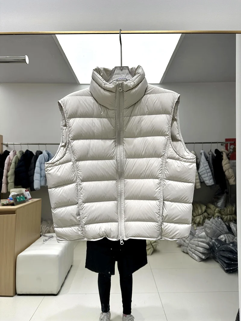 Korean Sle ort Lightweight 90% down Vest Women's Faionable Svel Jaet Thin Quilted Warm Stand Collar Coat
Korean Sle ort Lightweight 90% down Vest Women's Faionable Svel Jaet Thin Quilted Warm Stand Collar Coat