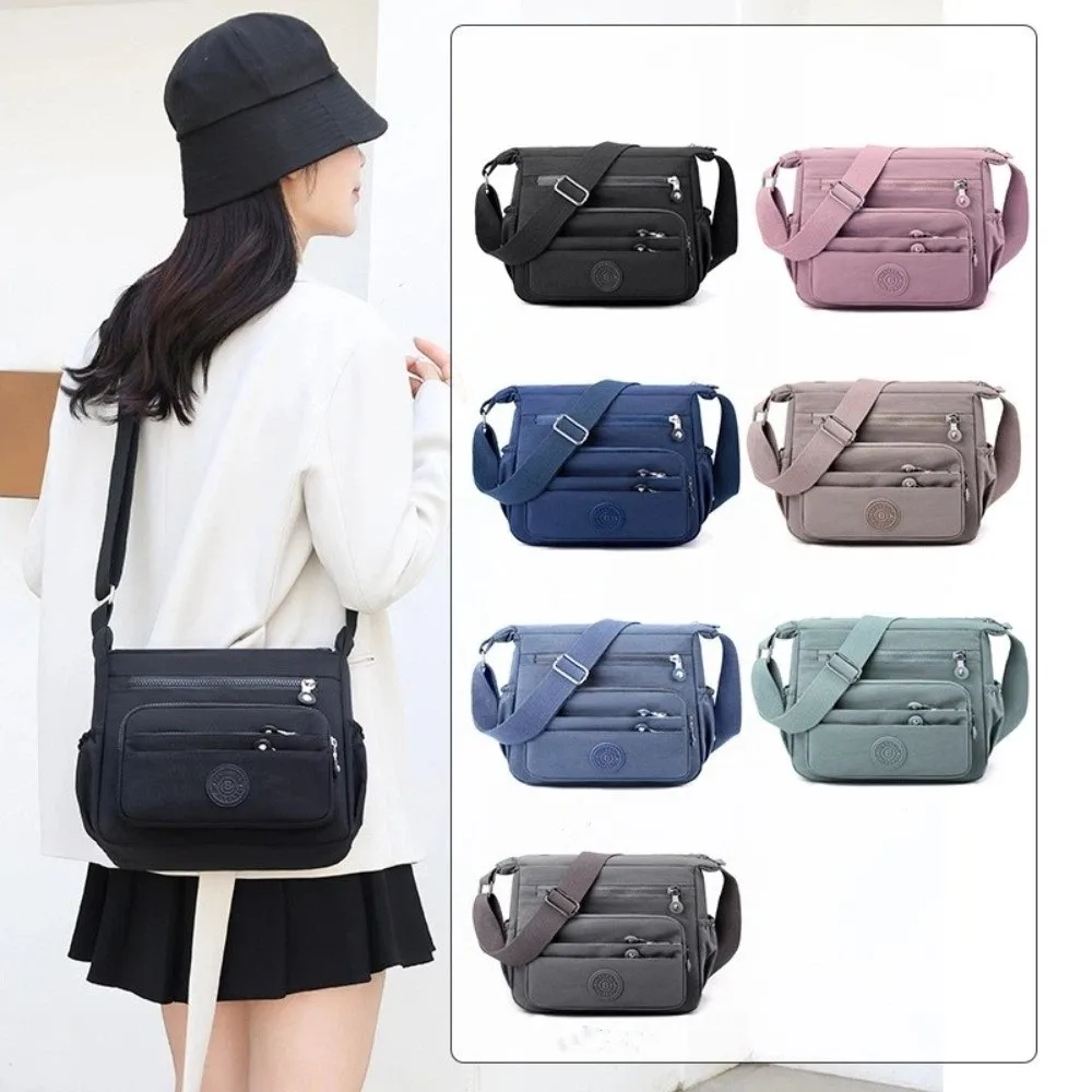New Nylon Shoulder Bag with Multiple Pockets Adjustable Strap Crossbody Bag Lightweight Zipper Messenger Bag
New Nylon Shoulder Bag with Multiple Pockets Adjustable Strap Crossbody Bag Lightweight Zipper Messenger Bag